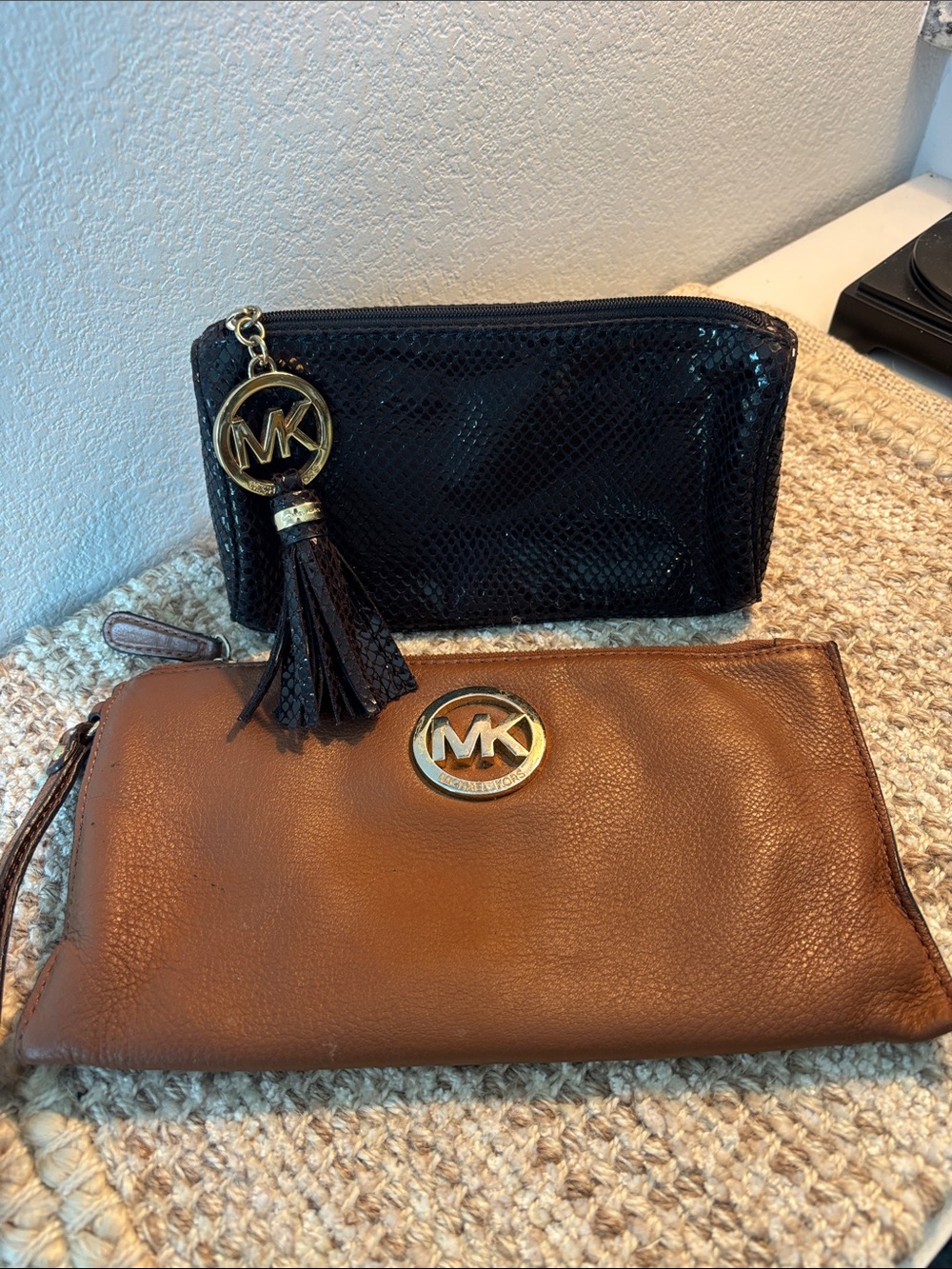 Michael Kors 2 pieces Brown Leather Wristlet Clutch and black cosmetic bag